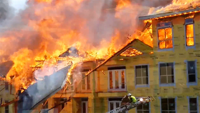 Firefighter Saves Man From Blazing Building Right On Time